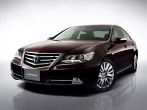 Sleek And Stylish Honda Legend On The Road Wallpaper