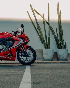 Sleek And Stylish - Honda's Red Motorcycle Wallpaper