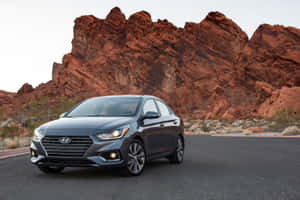 Sleek And Stylish Hyundai Accent On The Road Wallpaper