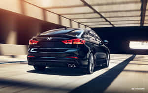 Sleek And Stylish Hyundai Elantra In Action Wallpaper