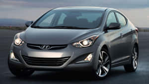 Sleek And Stylish Hyundai Elantra In Action Wallpaper