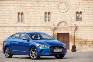 Sleek And Stylish Hyundai Elantra Parked On The Road Wallpaper