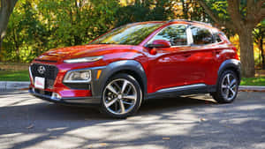 Sleek And Stylish Hyundai Kona On The Road Wallpaper