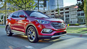 Sleek And Stylish Hyundai Santa Fe On The Road Wallpaper