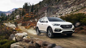 Sleek And Stylish Hyundai Santa Fe On The Road Wallpaper