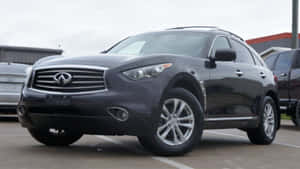 Sleek And Stylish Infiniti Fx35 On The Road Wallpaper