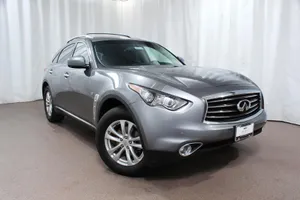 Sleek And Stylish Infiniti Qx70 In Vibrant Cityscape Wallpaper