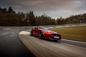 Sleek And Stylish Jaguar Xkr In A Stunning Setting Wallpaper