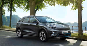 Sleek And Stylish Kia Niro In Elegant Setting Wallpaper