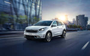 Sleek And Stylish Kia Niro On The Road Wallpaper