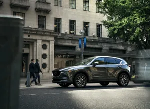 Sleek And Stylish Mazda Cx-5 In Stunning Scenery Wallpaper