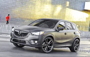 Sleek And Stylish Mazda Cx-5 In Vibrant Nature Setting Wallpaper