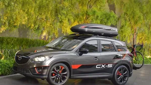 Sleek And Stylish Mazda Cx-5 On A Scenic Drive Wallpaper