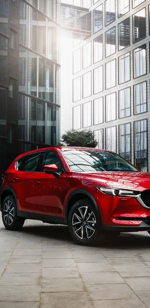 Sleek And Stylish Mazda Cx-5 On The Open Road Wallpaper
