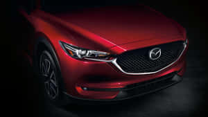 Sleek And Stylish Mazda Cx-5 On The Road Wallpaper