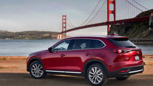 Sleek And Stylish Mazda Cx-9 In Action Wallpaper