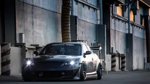 Sleek And Stylish Mazda Rx-8 Sports Car Wallpaper