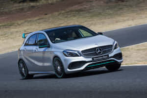 Sleek And Stylish Mercedes Benz A-class In Action Wallpaper