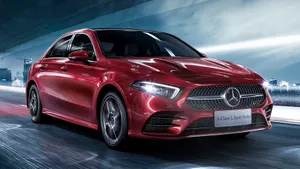 Sleek And Stylish Mercedes Benz A-class On The Road Wallpaper
