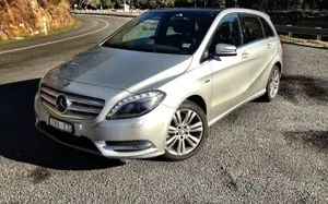 Sleek And Stylish Mercedes Benz B-class In A Cityscape Wallpaper