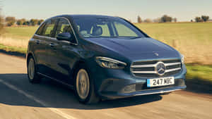 Sleek And Stylish Mercedes Benz B-class On The Road Wallpaper