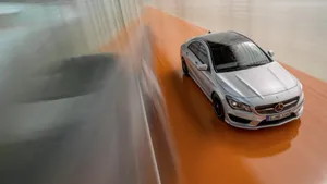 Sleek And Stylish Mercedes Benz Cla-class On City Street Wallpaper