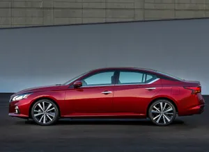 Sleek And Stylish Nissan Altima In Action Wallpaper