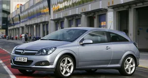 Sleek And Stylish Opel Astra In Motion Wallpaper