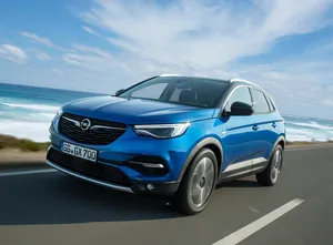 Sleek And Stylish Opel Grandland X In A Scenic Landscape Wallpaper