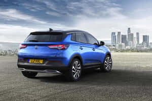 Sleek And Stylish Opel Grandland X In Motion Wallpaper