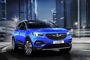 Sleek And Stylish Opel Grandland X On The Road Wallpaper