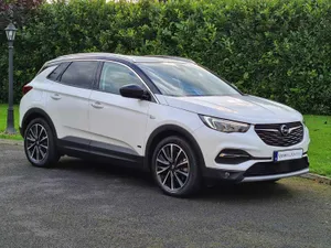 Sleek And Stylish Opel Grandland X On The Road Wallpaper