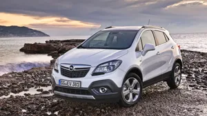 Sleek And Stylish Opel Mokka On The Road Wallpaper