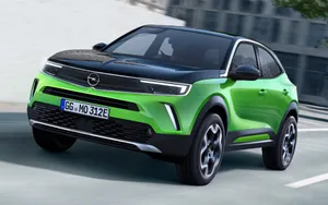 Sleek And Stylish Opel Mokka On The Road Wallpaper