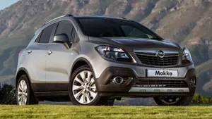 Sleek And Stylish Opel Mokka On The Road Wallpaper