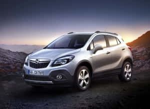 Sleek And Stylish Opel Mokka On The Road Wallpaper