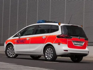 Sleek And Stylish Opel Zafira On The Road Wallpaper