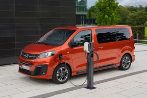 Sleek And Stylish Opel Zafira On The Road Wallpaper