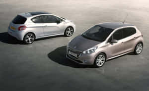 Sleek And Stylish Peugeot 208 In Action Wallpaper