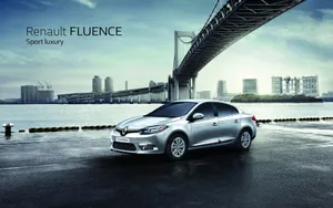 Sleek And Stylish Renault Fluence In Motion Wallpaper