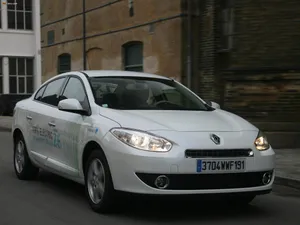 Sleek And Stylish Renault Fluence On The Road Wallpaper