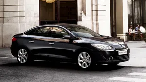 Sleek And Stylish Renault Fluence On The Road Wallpaper