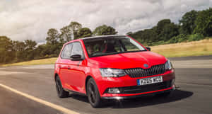 Sleek And Stylish Skoda Fabia In Action Wallpaper