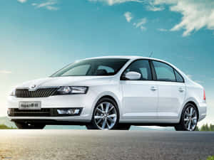 Sleek And Stylish Skoda Rapid In Action Wallpaper