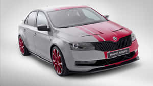 Sleek And Stylish Skoda Rapid In Vibrant City Wallpaper