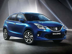 Sleek And Stylish Suzuki Baleno In Motion Wallpaper