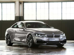 Sleek And Stylish, The Bmw 4 Series Is The Ultimate Driving Machine. Wallpaper