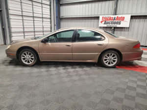 Sleek And Stylish: The Chrysler Lhs In Action Wallpaper