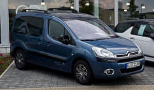 Sleek And Versatile Citroen Berlingo On Road Wallpaper