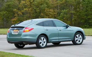 Sleek And Versatile Honda Crosstour On The Road Wallpaper